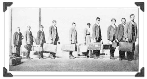 Photograph of Immigrants awaiting an inspection at Ellis Island