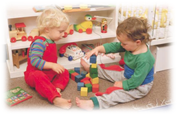 Photograph:Toddlers will watch others play, but they are not yet able to play together.